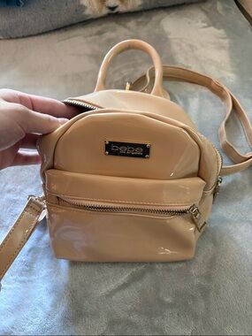 bebe Glossy Nude Patent Mini Backpack